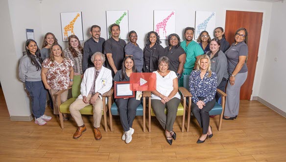 Group of health care staff in two rows
