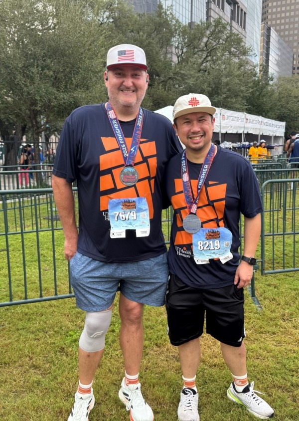 Two doctors standing side by side after the race