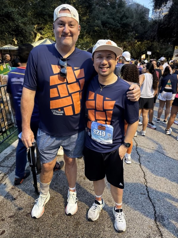 Two doctors standing side by side before the race