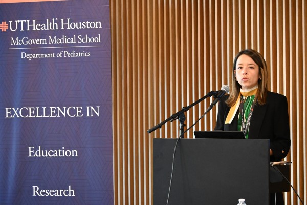 Doctor presenting at podium