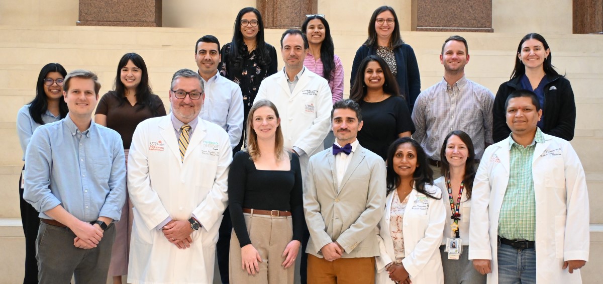 Group of doctors on concrete steps