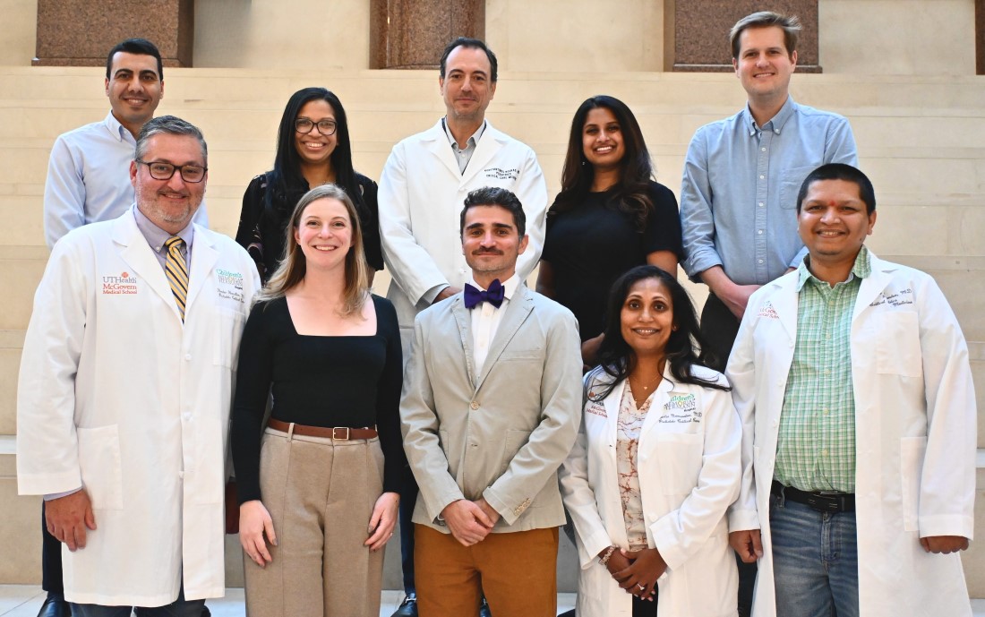 Group of doctors on concrete steps