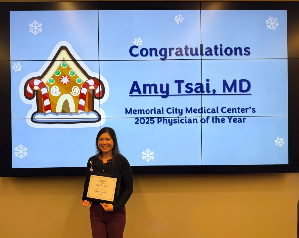 doctor standing in front of PPT slide show