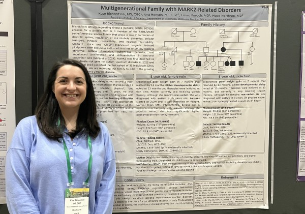 Kate Richardson standing in front of research poster