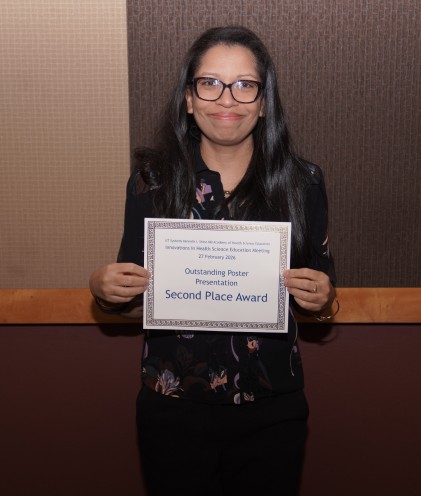 Dr. O'Connor holding certificate