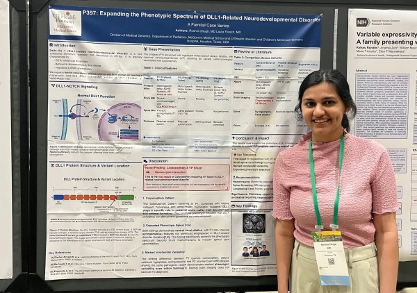 Roshni in front of poster