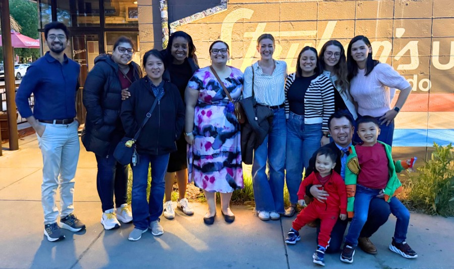 Group of people outside of restaurant