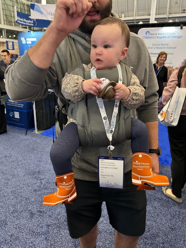 Baby wearing koozies as booties
