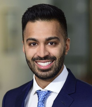 A headshot of Ryan Dhinsda, MD, PHD