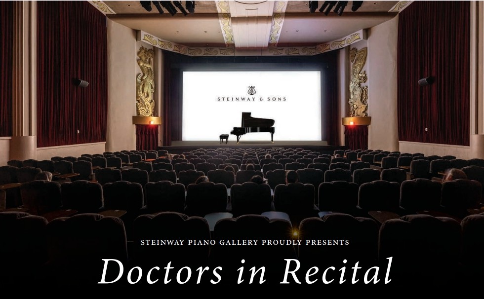 Auditorium with grand piano on stage and event title