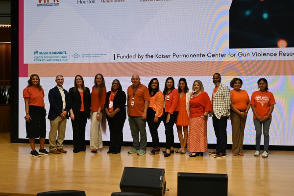Group of people standing on stage