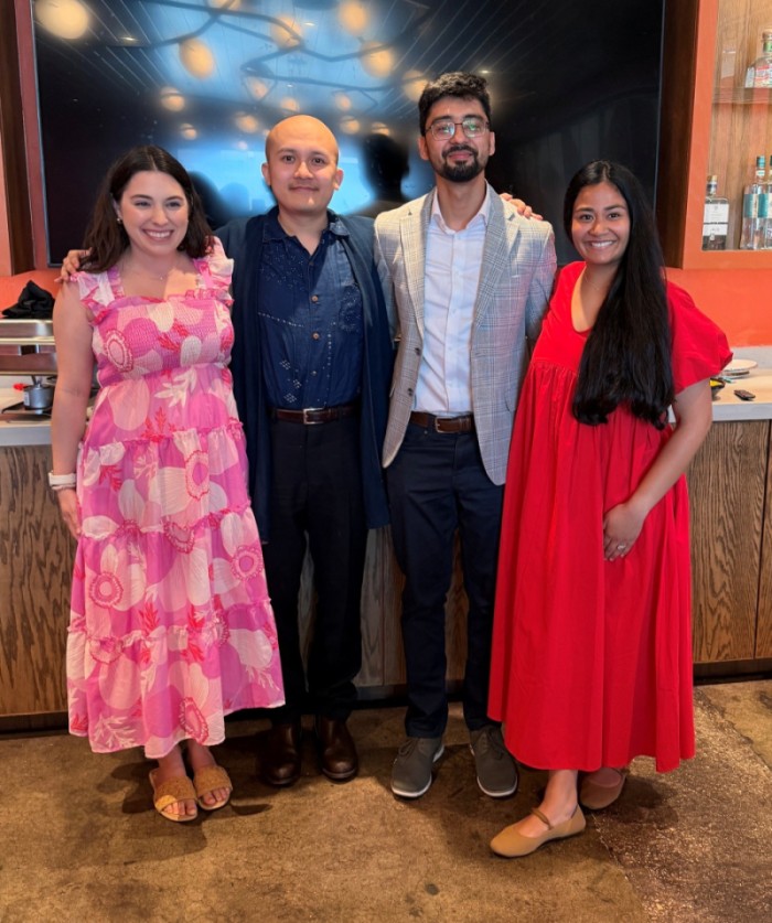 The 4 PHM fellows at a restaurant