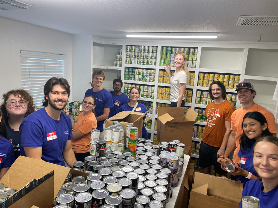 Medical students and faculty work in a food pantry