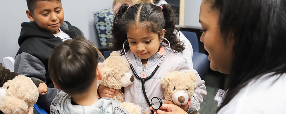 Young children visited the teddy bear clinic at UTHealth Houston Cares and took home their newest stuffed friend. (Photo by Kacie Fromhart/UT Physicians)