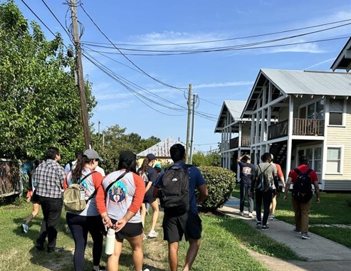 group of students touring Project Row House. 