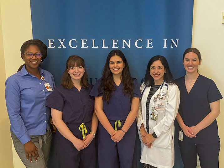 Lucia Martinez-Sanchez, Valerie Lomonte, and Drs. Asia Bright and Renee Flores group photo at Health Science Education conference.