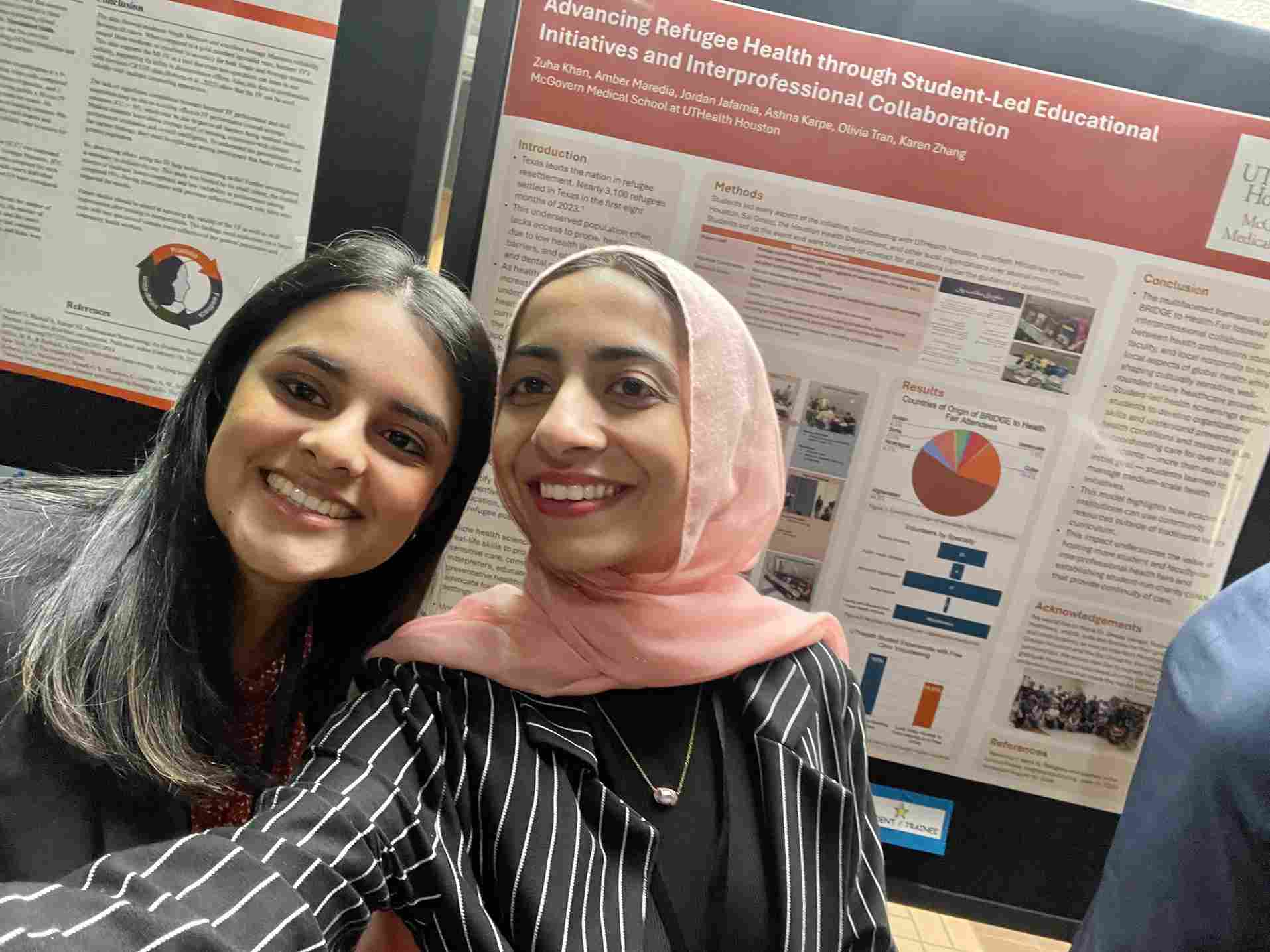 McGovern students who won SERVE scholarship standing together in front of abstracts at UTSHINE Conference.
