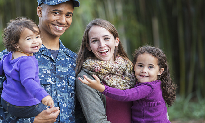 Military Homecoming. Cheerful Veteran and Family