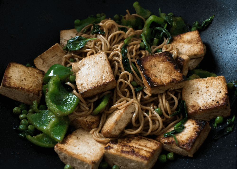 Tofu and noodle stir-fry with greens