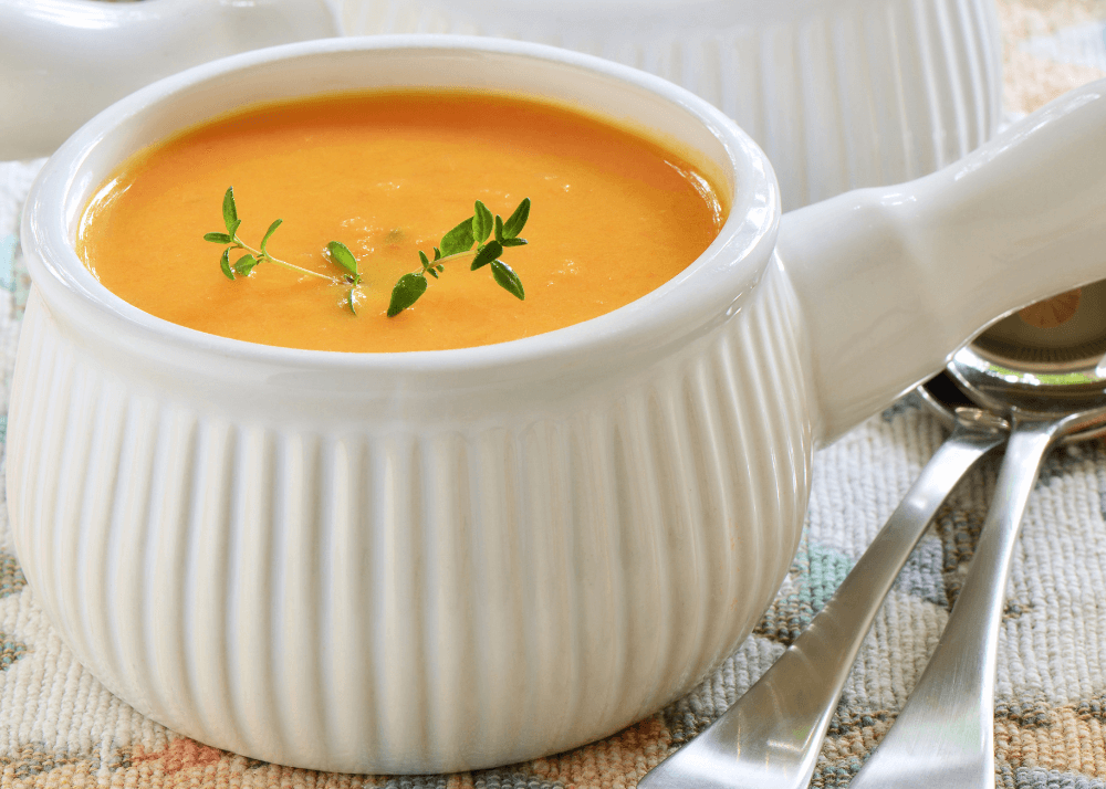 Butternut squash soup in a white bowl