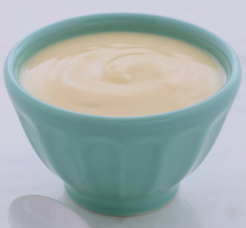 Yogurt fruit dip in a small teal bowl