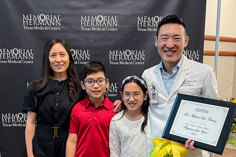 Dr. Michael Chang with his family after winning the Children's Memorial Hermann Hospital Physician of the Year for 2023.