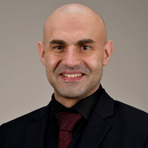 Dr. Costin Leu