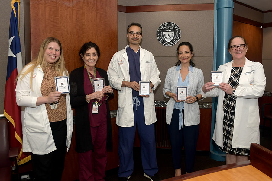 Neurology faculty receiving Honor Your Caregiver pins