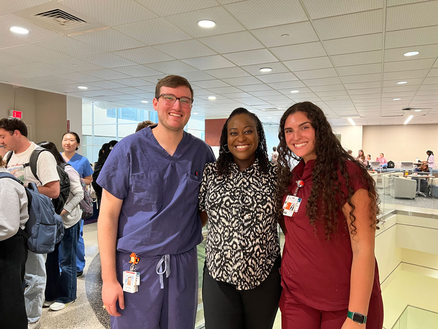 Dr. Gloria Odum with Student Wellness & Resilience Committee leaders Landon Rosckes, MS4 and Allie Goff, MS2