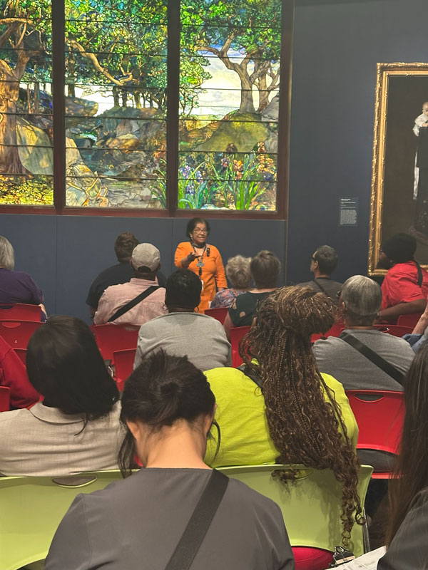 Discussing some of the art at Art Beyond Sight