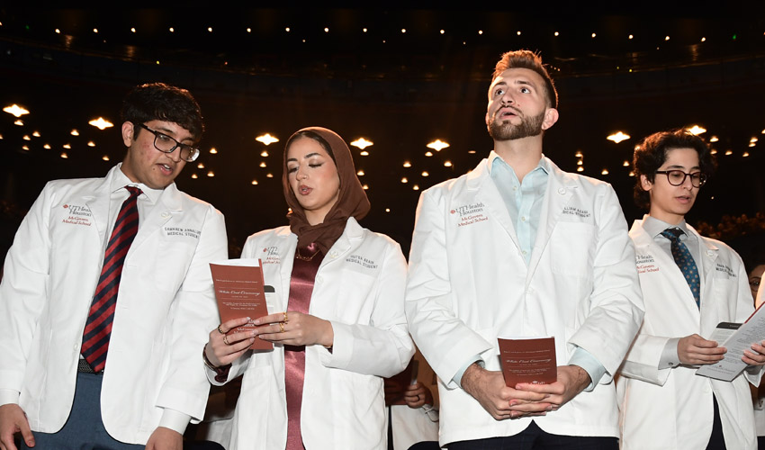 McGovern Medical School students recite the Oath of Hippocrates at the 2026 White Coat Ceremony
