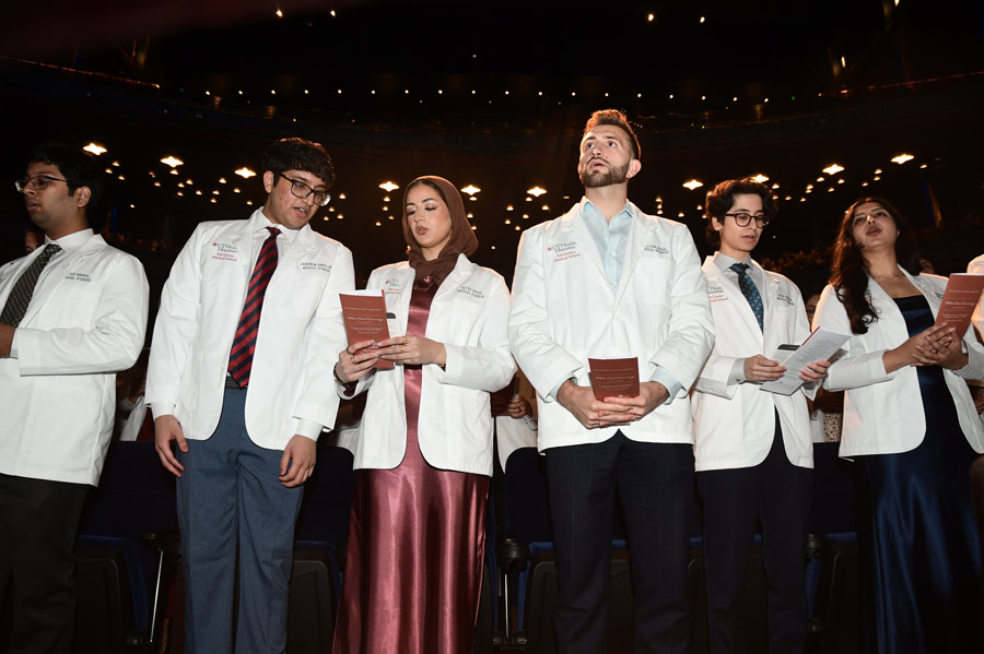 McGovern Medical School students recite the Oath of Hippocrates at the annual White Coat Ceremony