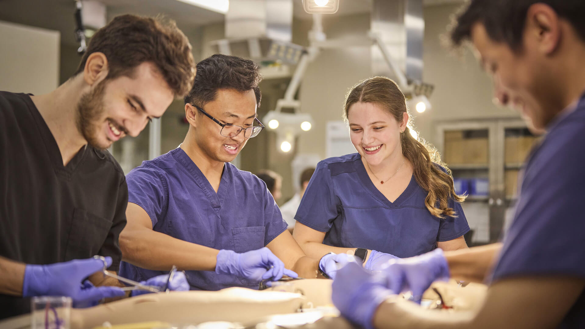 Students working in operation room
