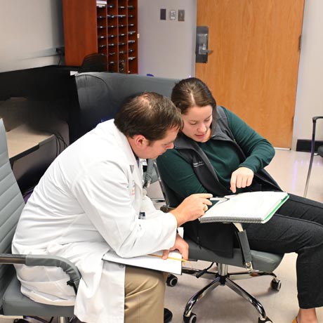 A faculty member from the Department of Pediatrics mentors a student as part of the CONNECT program.