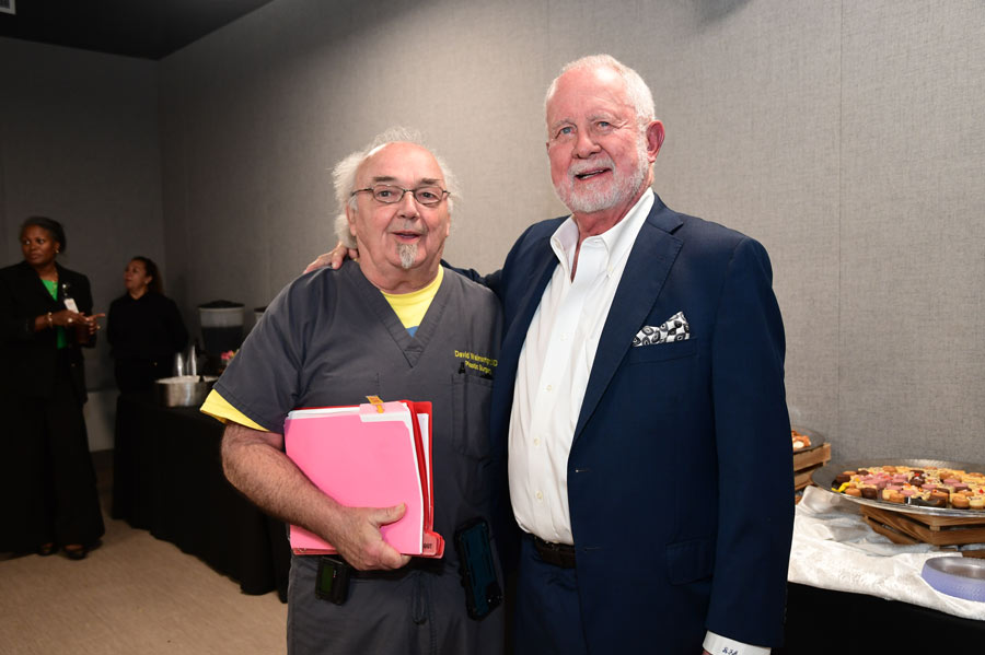 Richard Andrassy, MD, poses with a colleague during his retirement celebration.